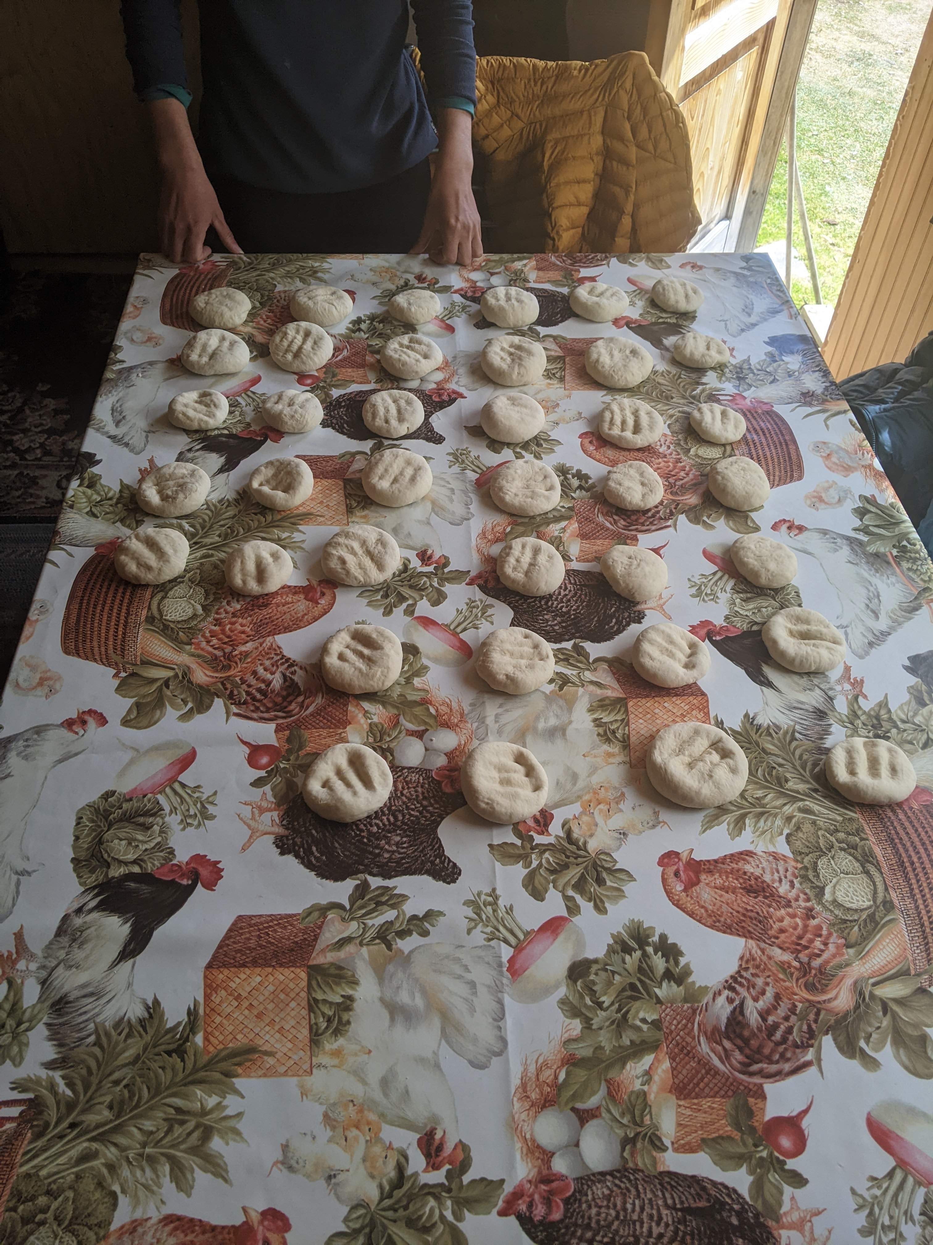 Learning how to do sopaipillas in Candelario Mancilla